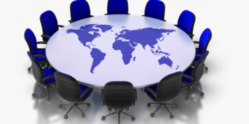 496-4962185_conference-clipart-round-table-meeting-eagleburgmann-world-map-e1642786687999